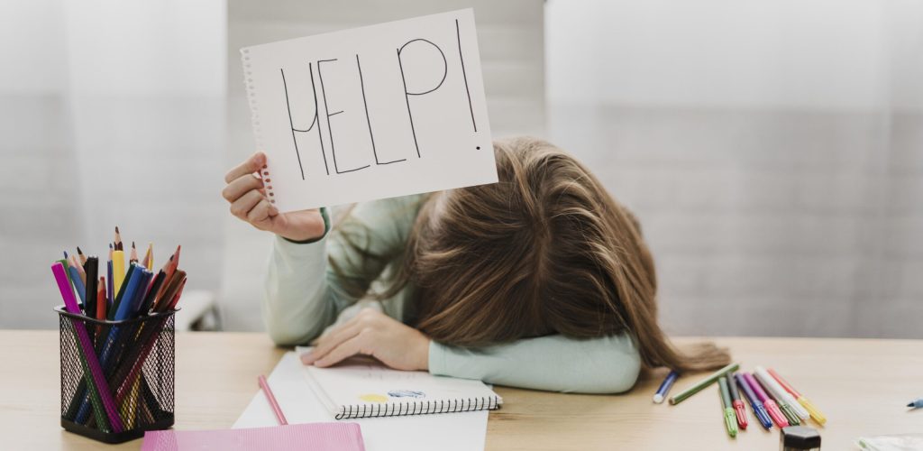 little-girl-holding-help-message-white-paper